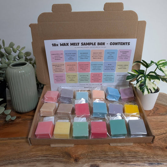 a brown postal box of wax melts containing 18 different fragrances, designer, clean, fresh out doors, fruity & Floral fragrances there's something for everyone. The perfect gift for someone special. 